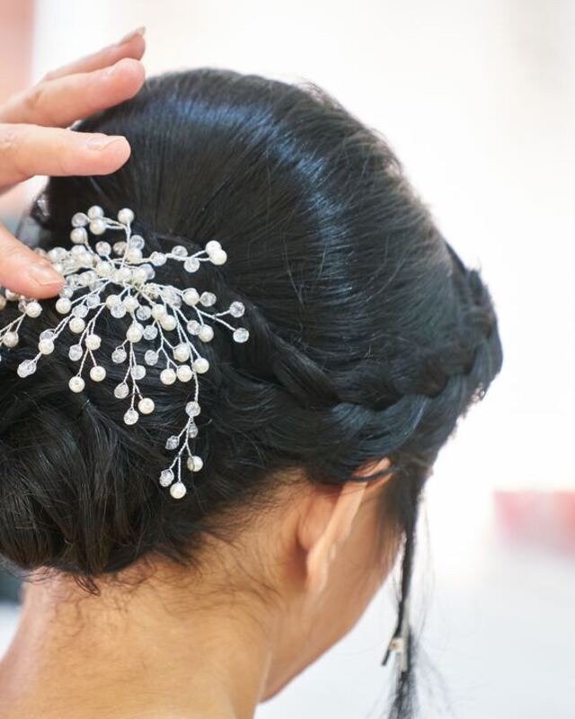 Black hair in an updo, before LooksAI